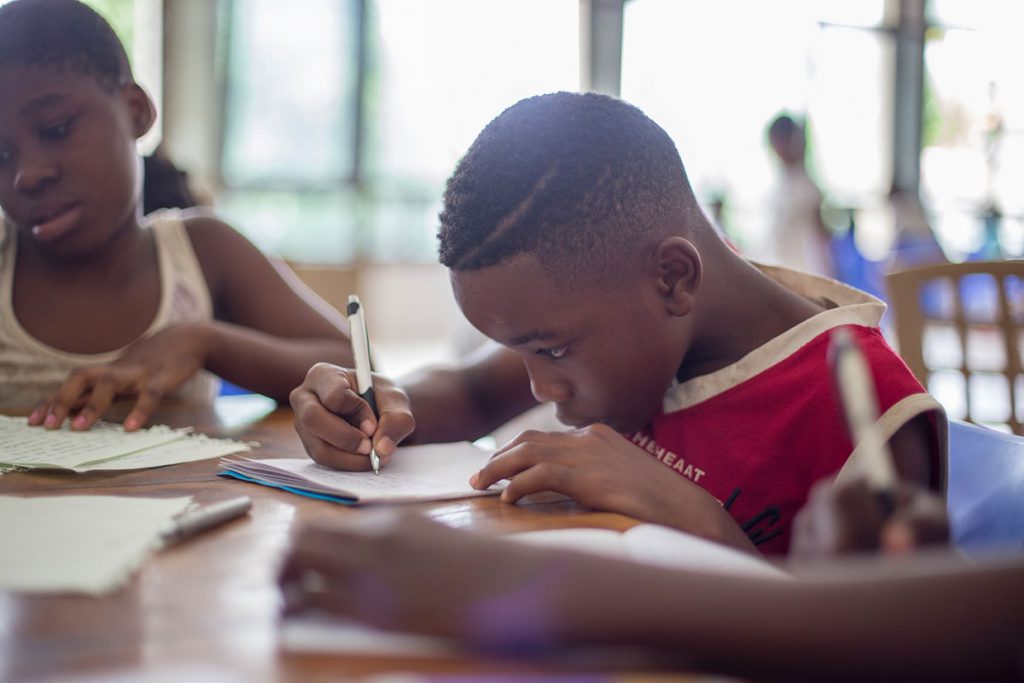 boy-writing-on-paper-1024x683.jpg