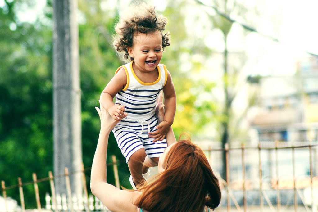 woman-lifting-child-1024x683.jpg