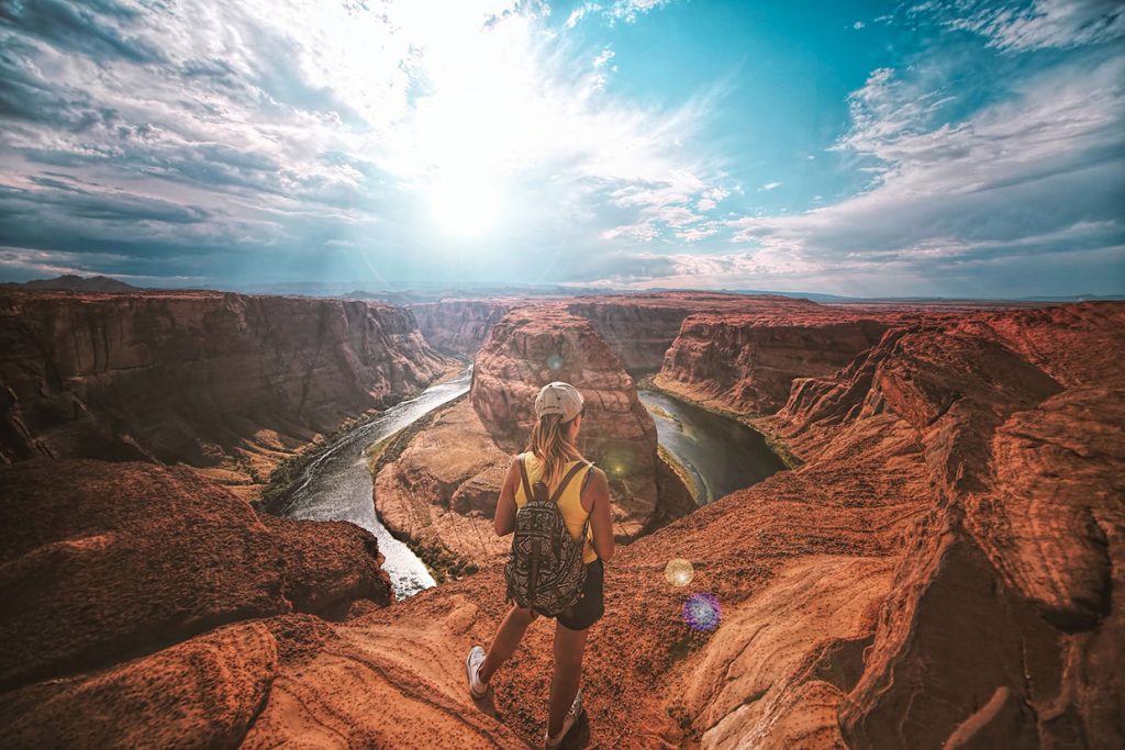 woman-standing-on-top-of-canyon.jpg